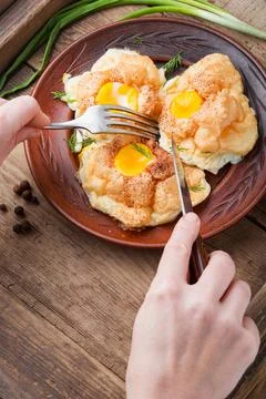 Fried eggs in a plate Stock Photos