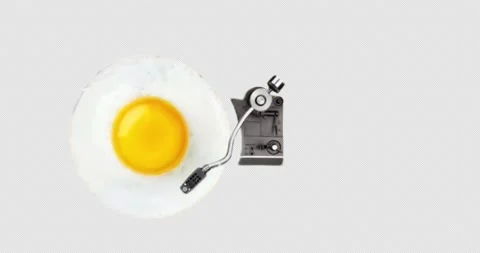 Fried eggs on record player Stock Footage 222963850