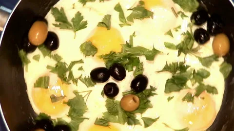 Fried eggs rotating Stock Footage 43738442
