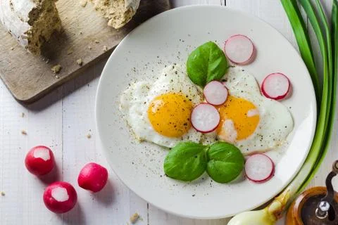 Fried eggs shape hearts Valentines dish Stock Photos