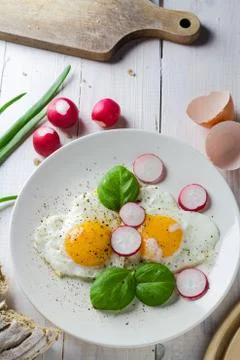 Fried eggs shape hearts Valentines dish Stock Photos