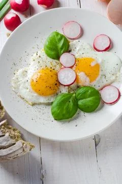 Fried eggs shape hearts Valentines dish Stock Photos