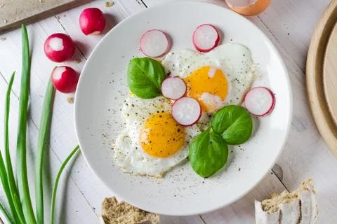 Fried eggs shape hearts Valentines dish Stock Photos