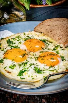 Fried eggs with a slice of bread Foto stock