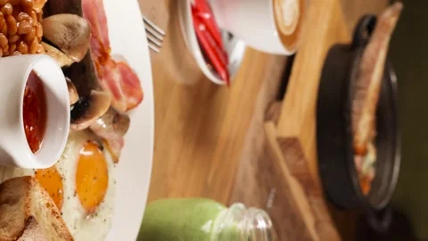 Fried eggs with spices and bacon in the morning for breakfast Stock Footage 263730087
