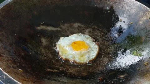 Fried eggs sunny side up Stock Footage 233488121