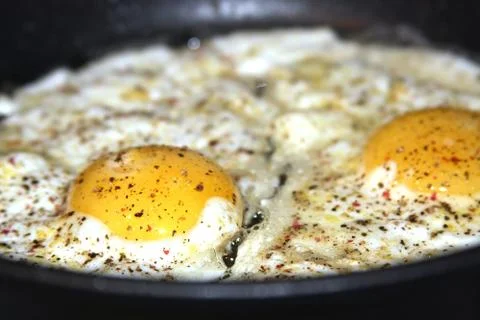 Fried eggs, sunny side up Stock Photos