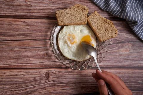Fried eggs with two slices of bread Stock Photos