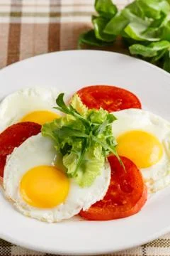 Fried eggs with vegetables Stock-Fotos