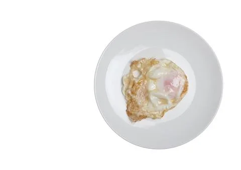 Fried eggs on a white background Stock Photos