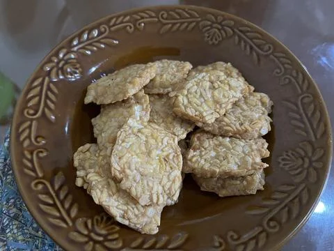 Fried fermented soybean cake served in a brown plate, Stock Photos