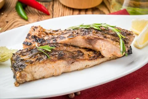 Fried fish carp on the grill Stock Photos