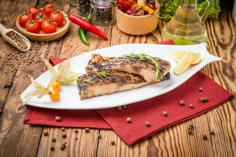 Fried fish carp on the grill Stock Photos