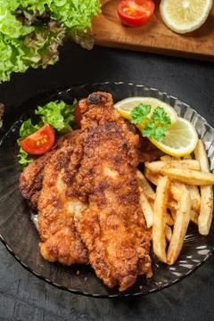 Fried fish in crispy batter with chips Stock Photos