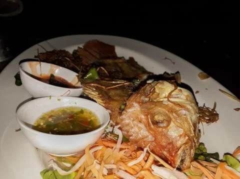 Fried fish in a dish Stock Photos