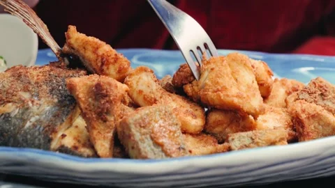 Fried fish dorado in batter with tartar sauce and lemon slices. Stock Footage 309519100