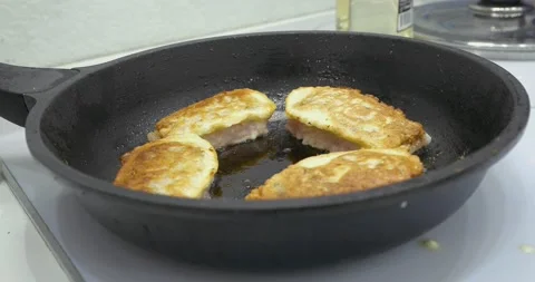 Fried fish in a frying pan Stock Footage 145520141