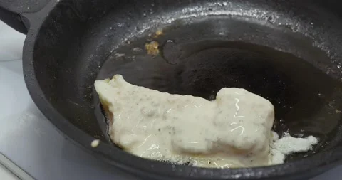 Fried fish in a frying pan Video stock 145745753