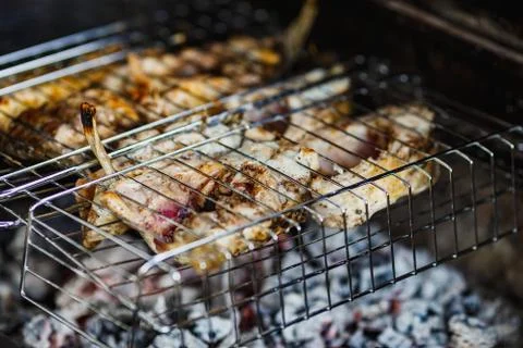 Fried fish on the grill Stock Photos