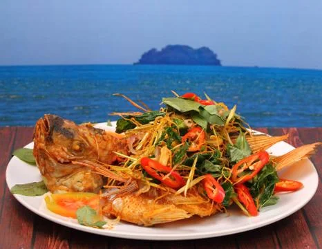 Fried fish herbal Stock Photos