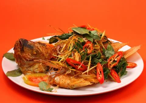 Fried fish herbal Stock Photos