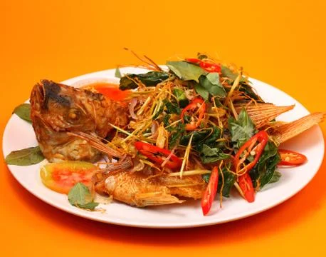 Fried fish herbal Stock Photos