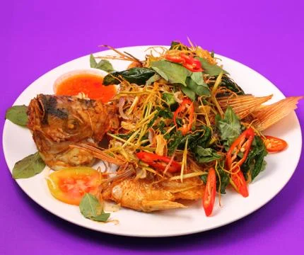 Fried fish herbal Stock Photos