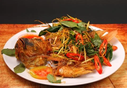 Fried fish herbal Stock Photos