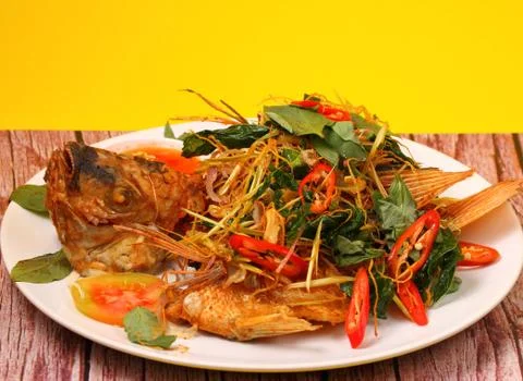 Fried fish herbal Stock Photos
