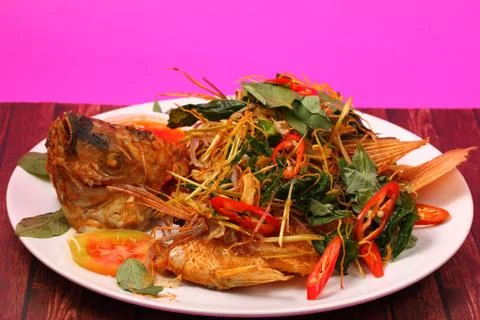 Fried fish herbal Stock Photos