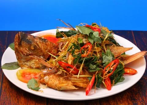 Fried fish herbal Stock Photos