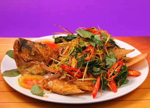 Fried fish herbal Stock Photos