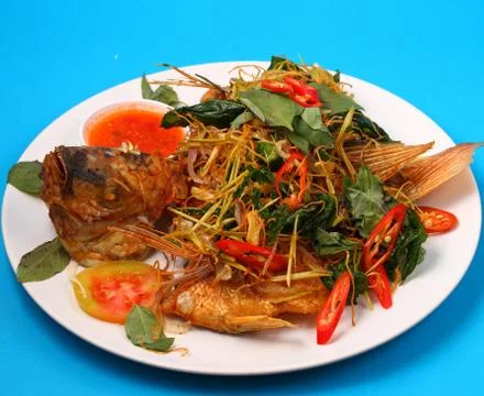 Fried fish herbal Stock Photos