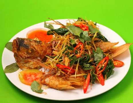 Fried fish herbal Stock Photos