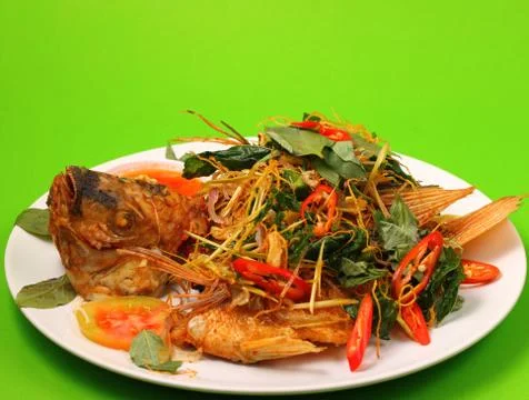 Fried fish herbal Stock Photos