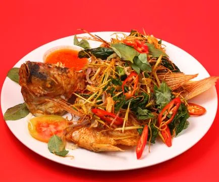 Fried fish herbal Stock Photos
