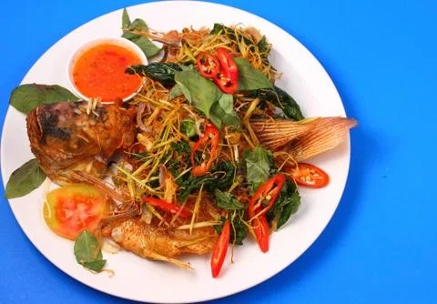 Fried fish herbal Stock Photos