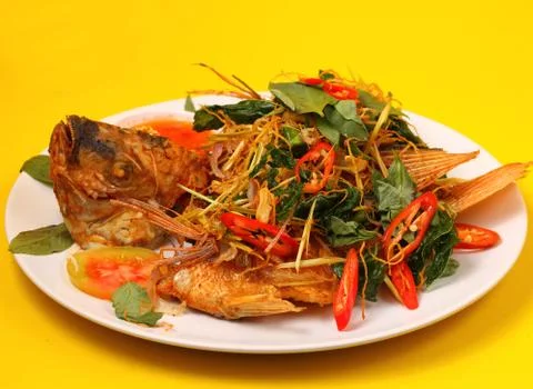 Fried fish herbal Stock Photos
