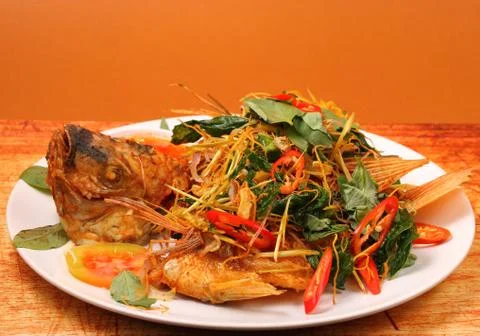 Fried fish herbal Stock Photos