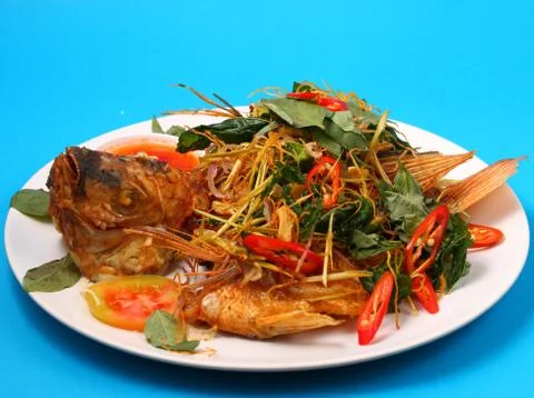 Fried fish herbal Stock Photos