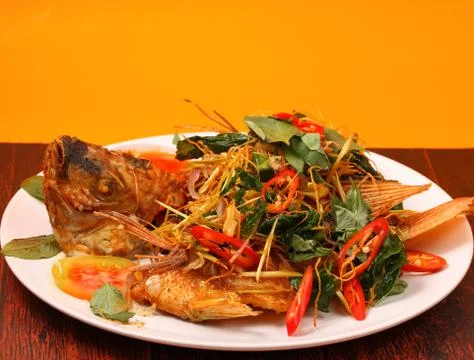 Fried fish herbal Stock Photos