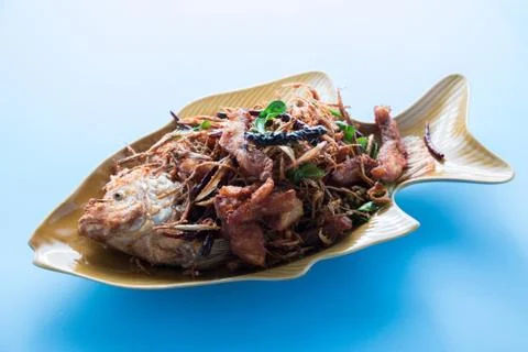 Fried Fish With herbs Stock Photos