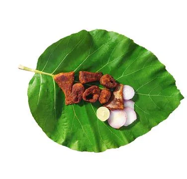 Fried fish on a leaf with white background Stock Photos