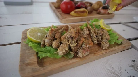 Fried fish with lemon Stock Footage 97981117