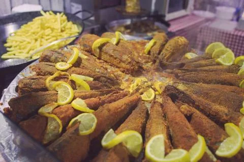 Fried Fish with Lemon Stock Photos