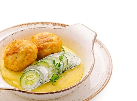 Fried fish mousseline cutlets with mashed potatoes Stock Photos