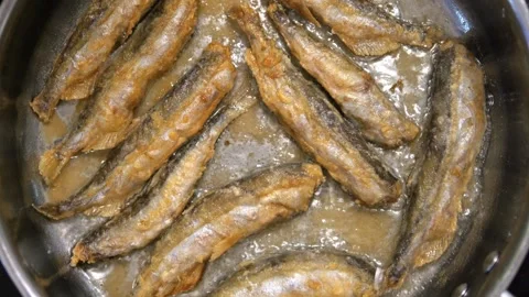 Fried Fish In Pan. Fish Frying In Oil. Roasted Seafood Cuisine 4K Stock Footage 267790081