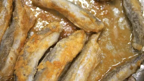 Fried Fish In Pan. Fish Frying In Oil. Roasted Seafood Cuisine 4K Stock Footage 270541583