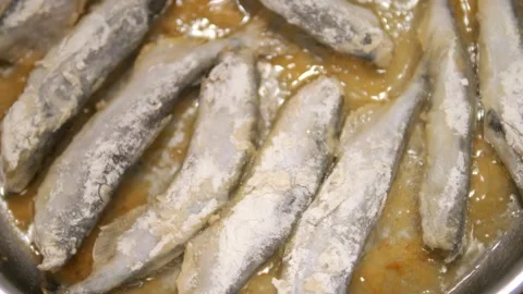 Fried Fish In Pan. Fish Frying In Oil. Roasted Seafood Cuisine 4K Stock Footage 271257644