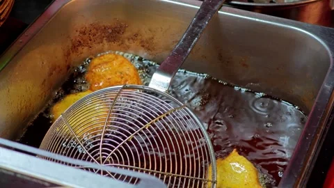 Fried fish-paste balls in the pan. Stock Footage 306924380